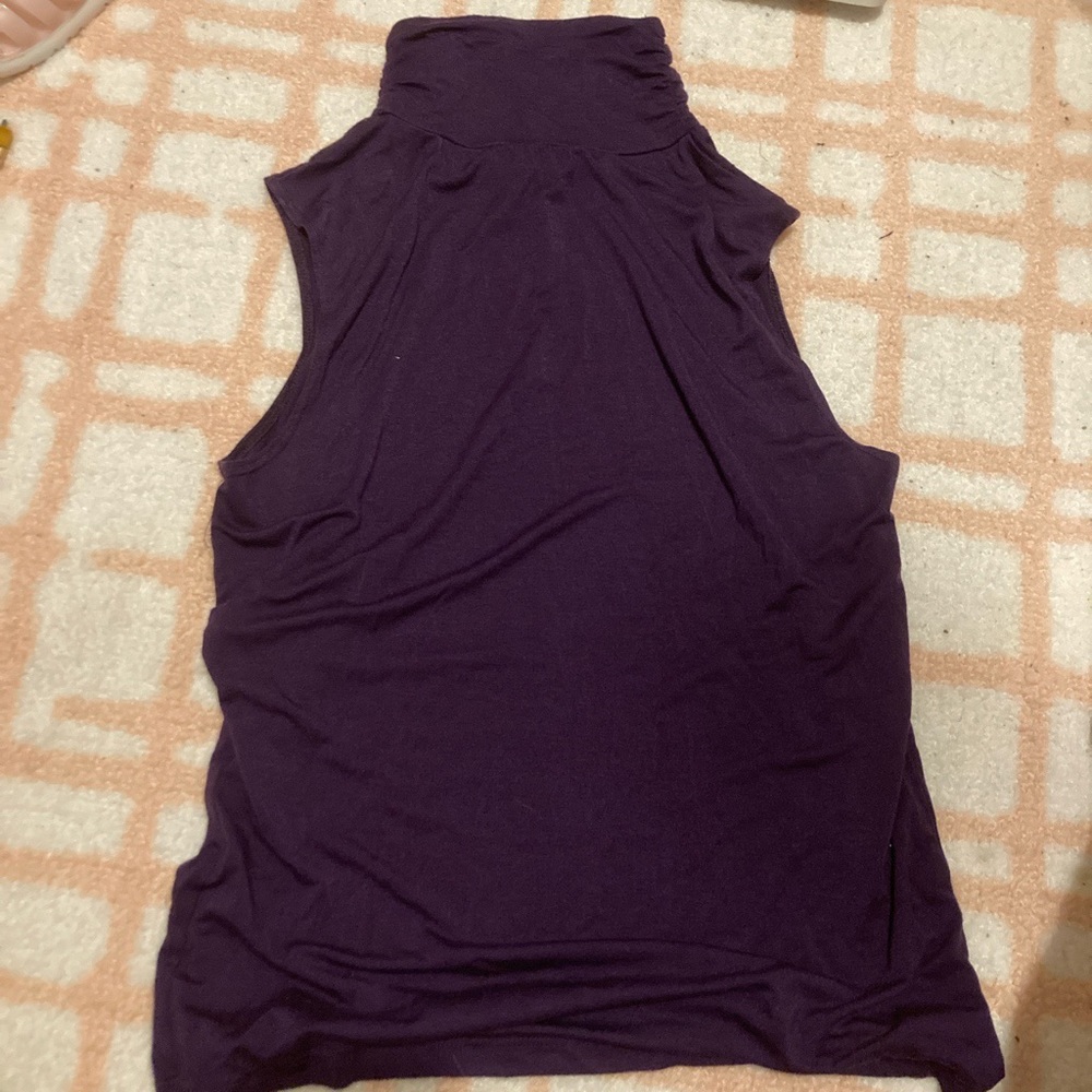 Purple sleeveless turtleneck
